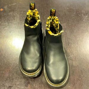 Kids Dr. Martens size 3Y. Black leather with faux fur cheetah print interior.